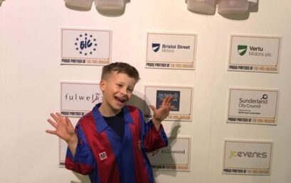 Leo loving the Fans Museum Shirt Collection!